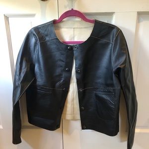 Black leather on suede jacket.